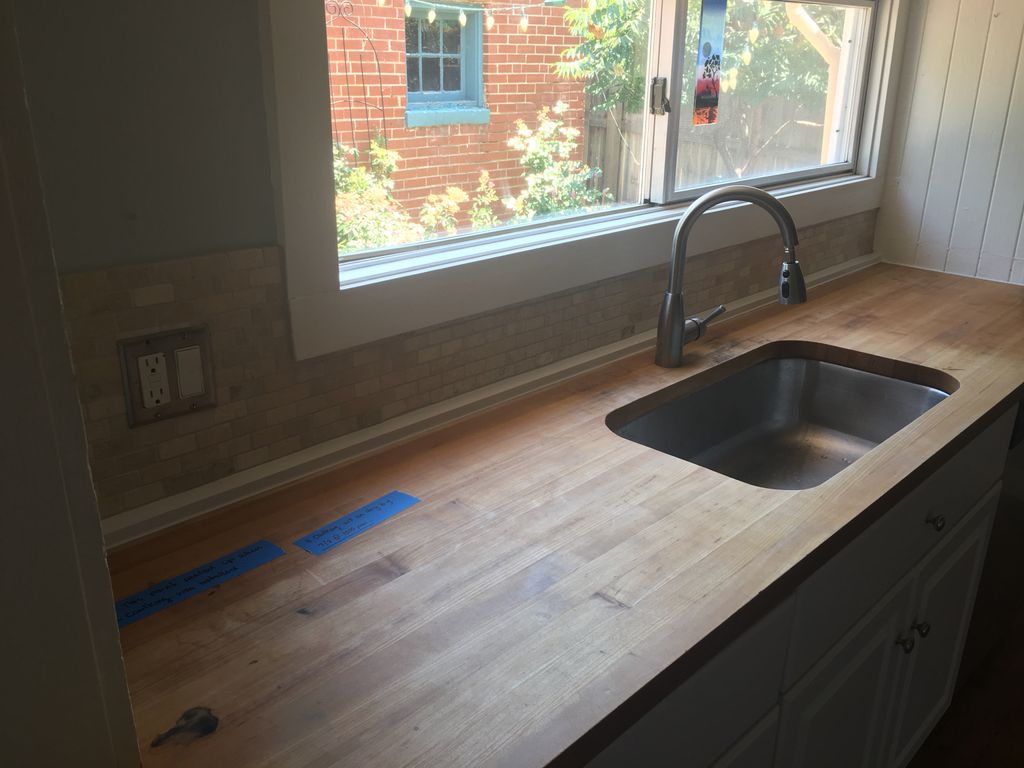 Wall repair and new backsplash installation.