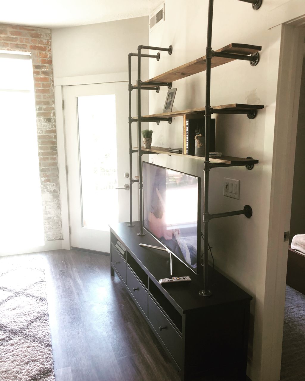 Custom Concept Creation Pipe Shelf TV Stand 