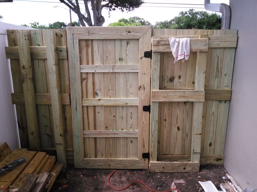 CUSTOM BUILT GATE AND FENCE (PRESSURE TREATED 1 BY