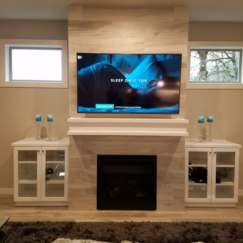 65 inch samsung mounted over tile fireplace with w