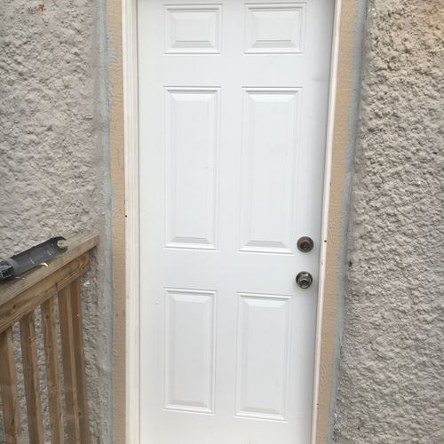 Installed new exterior door on rental property.