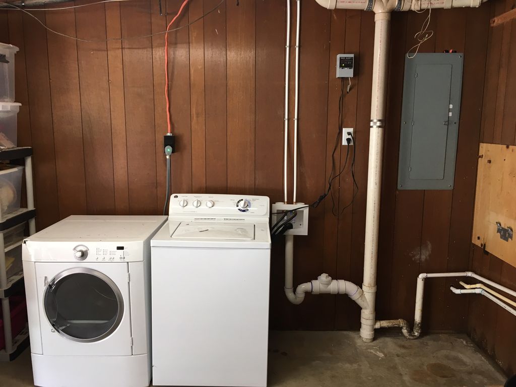 Added plumbing for wash machine in garage.