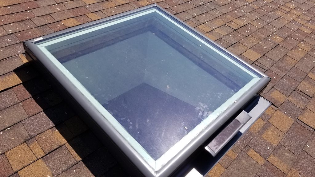 Solar powered remote operating skylight.