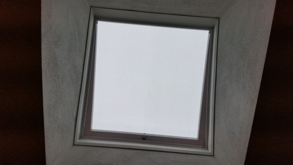 Solar powered remote operating skylight.