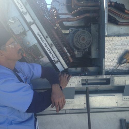 Repair and maintenance of rooftop package unit for