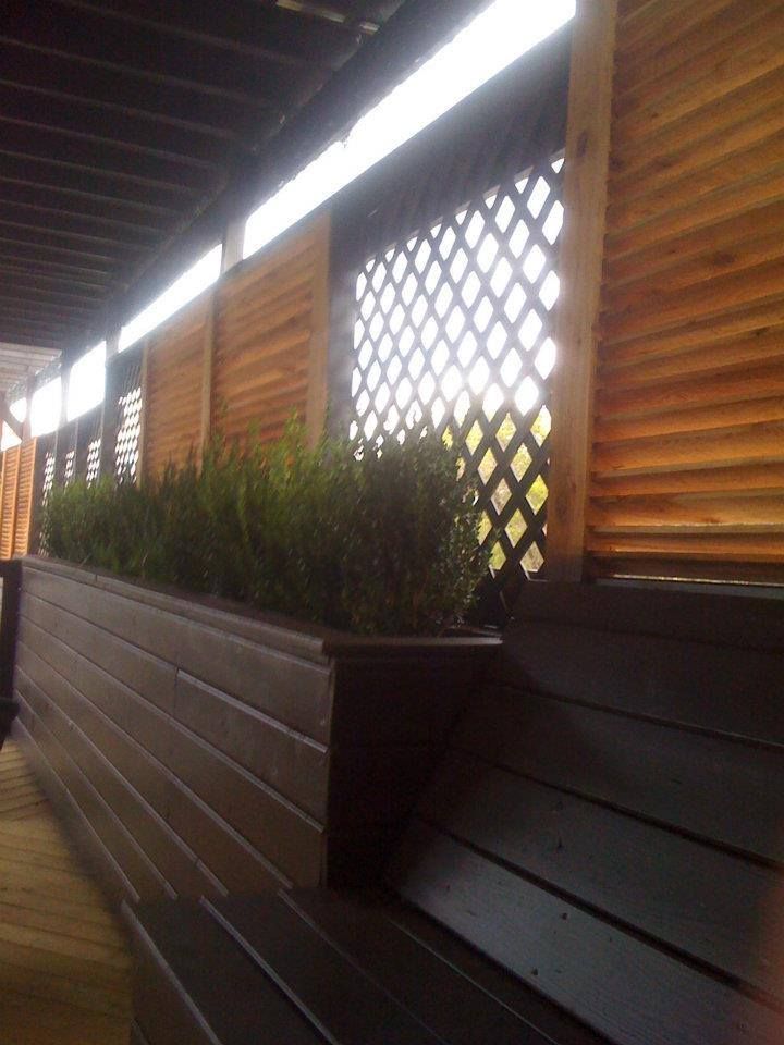 Patio design with built in planters and seating