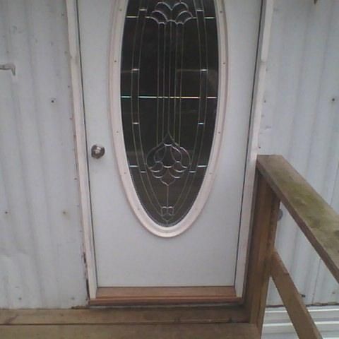 new front door with the porch I rebuilt. Door also