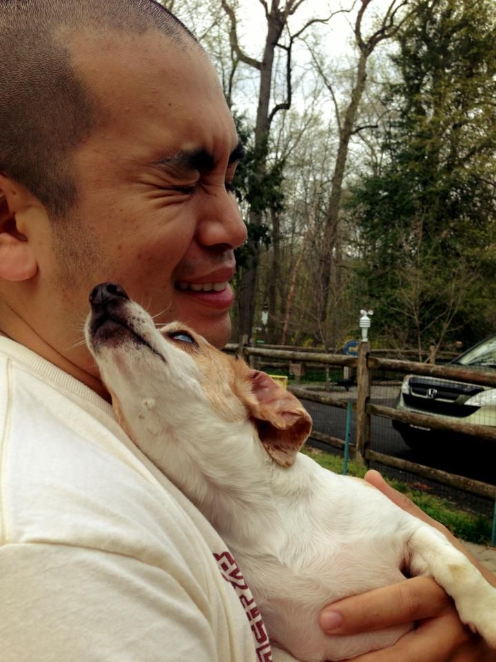 Christian snuggling with Belinda the deaf Dachshun