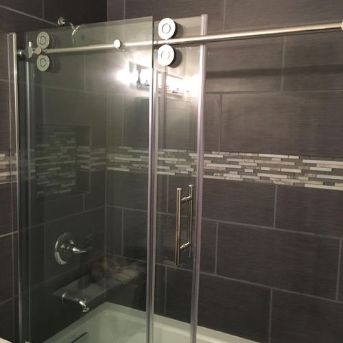 Custom shower, with tile, painting and glass door 