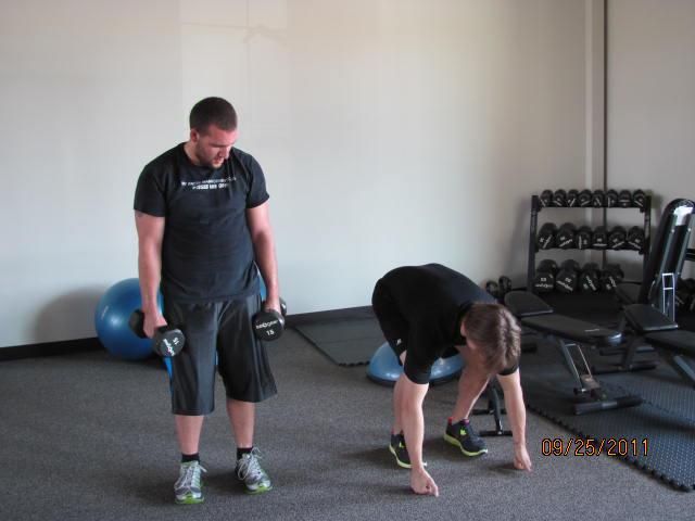 An individual working out with the assistance of t