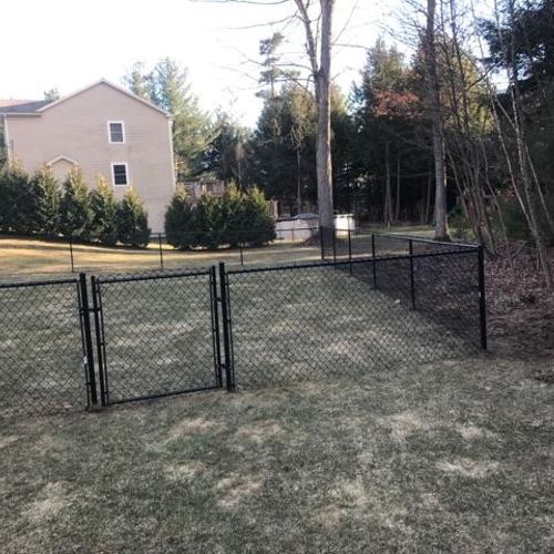 Installing a black chain link fence