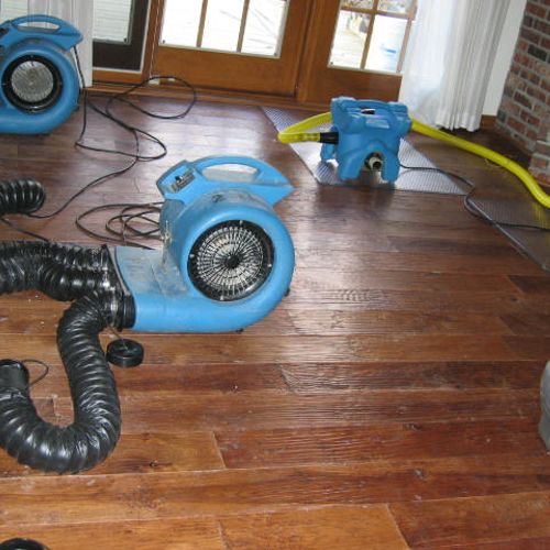 Hardwood floor drying after water damage