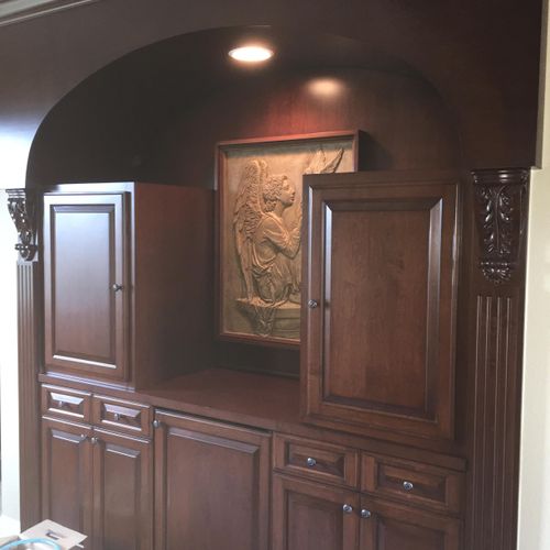 Custom created wall unit and cabinets.