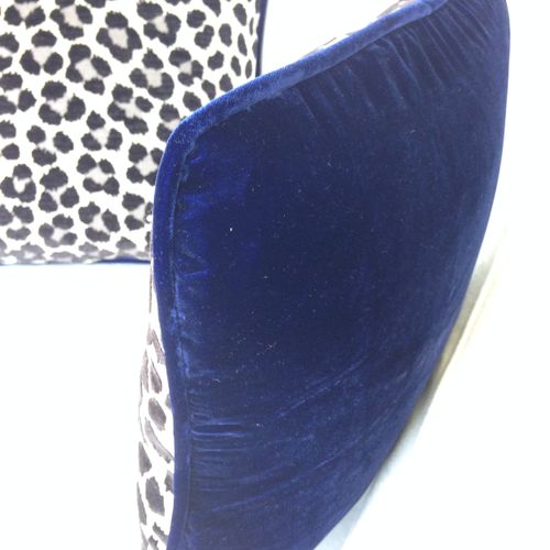 front cheetah linen print; back drapeable blue vel