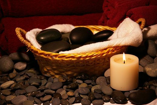 Experience deep relaxation with our hot stone arom