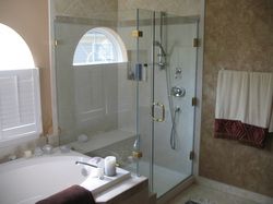 Bathroom remodel with glass shower and separate ba