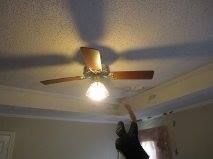 In this photo removing the popcorn ceiling and mak