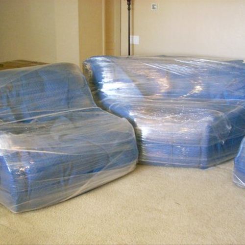 sectional couch, wrapped and ready to go