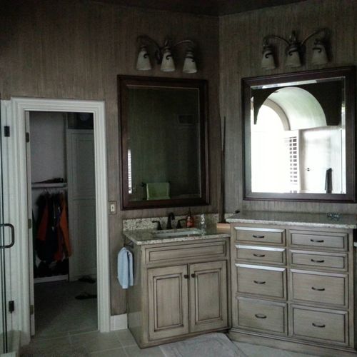 Master bathroom, creamy antique finish on cabinets