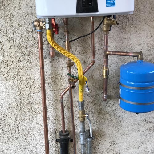 Navin tank less water heater. We love these units.