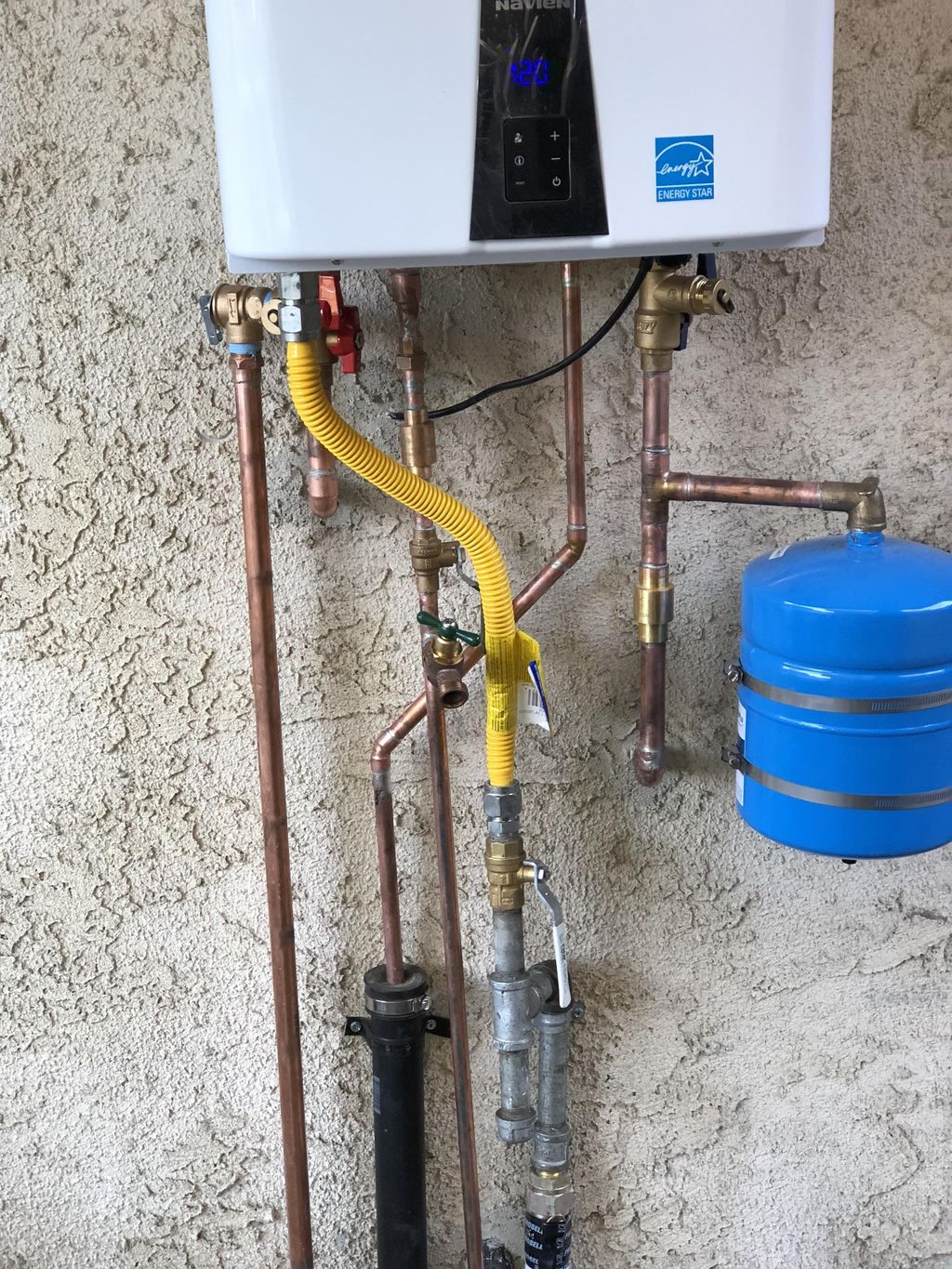 Navin tank less water heater. We love these units.
