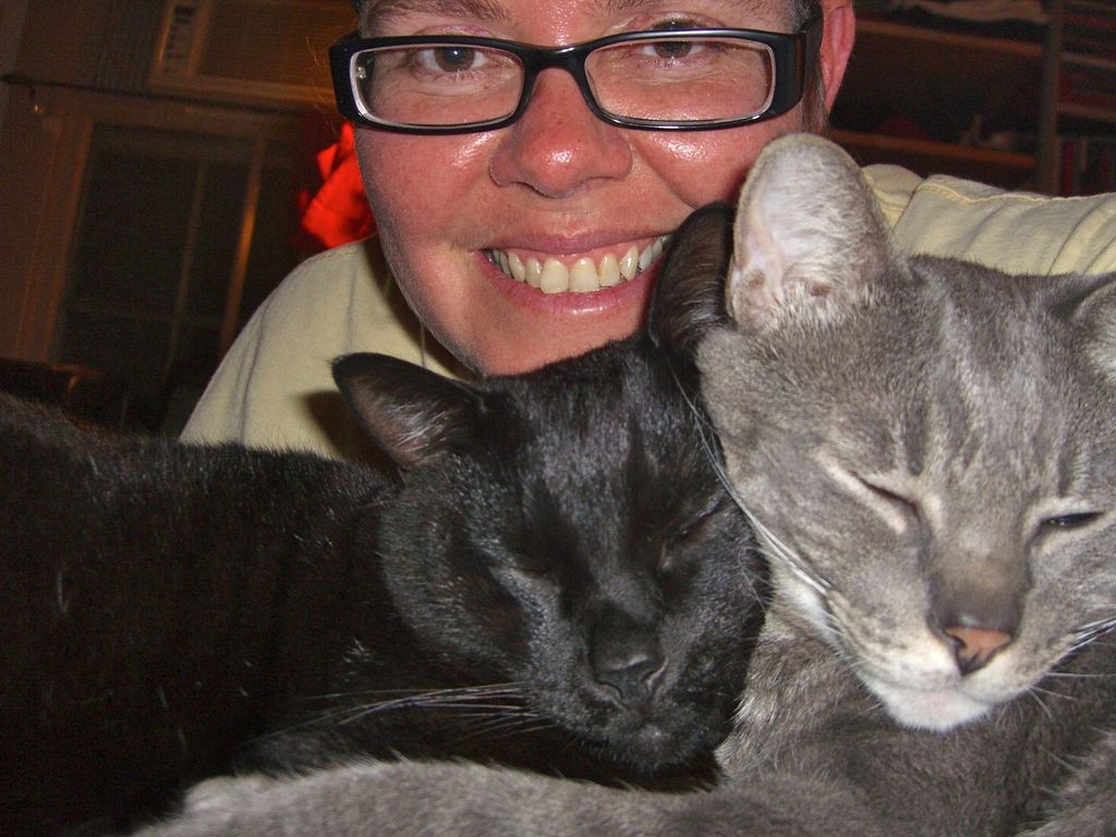 me with my own cats, stencil on the left (black ca