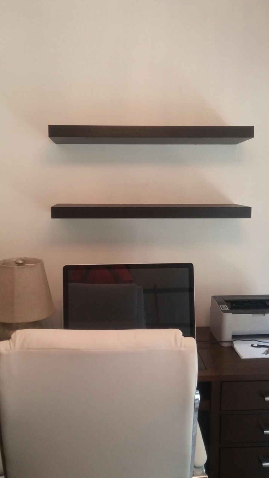 wooden shelves installed concrete wall