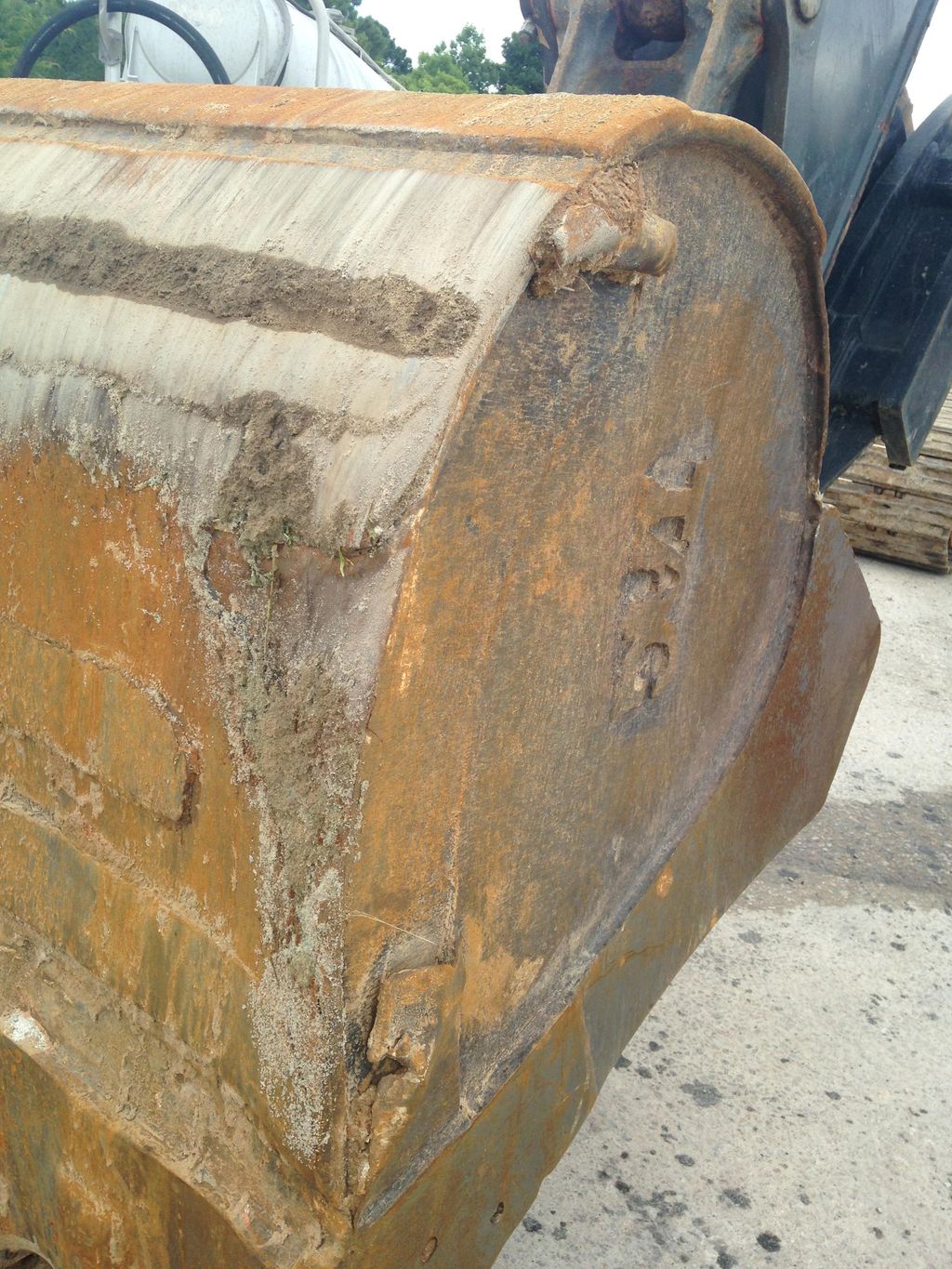 Excavator bucket restoration project before