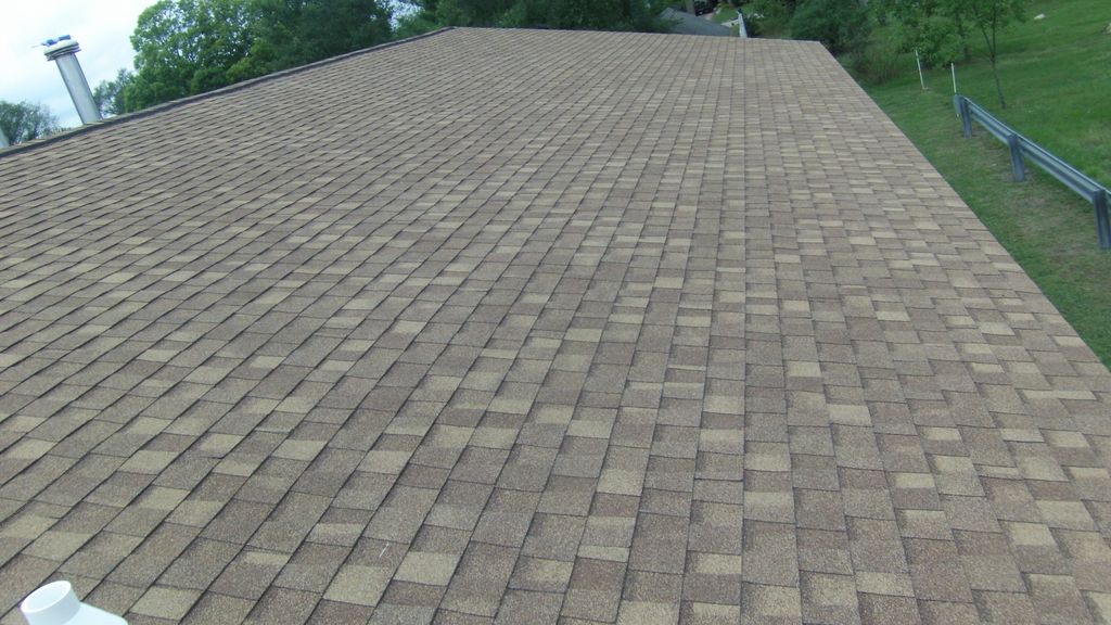 north side of roof re-shingled with Landmarks