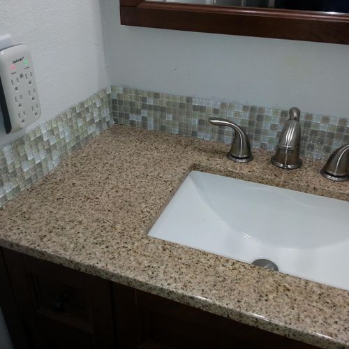 Vanity, countertop, faucet, and backsplash install