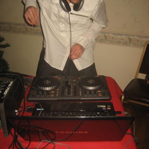 DJ GAMBLER MIXING UP TRACK AT THE 2010 CHRISTMAS P