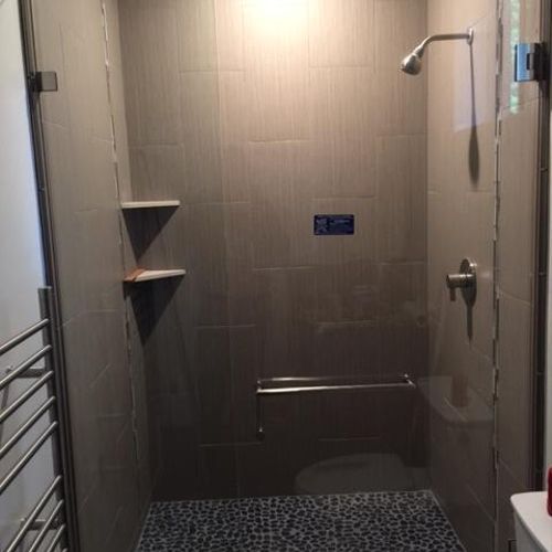 Custom frameless shower enclosure