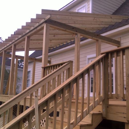 Here is a deck and screen porch being framed.