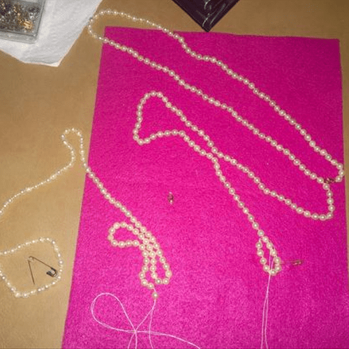 Restrung 6 foot strand of pearls - the right way w