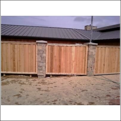 Board on board fence with cap & trim and stone col