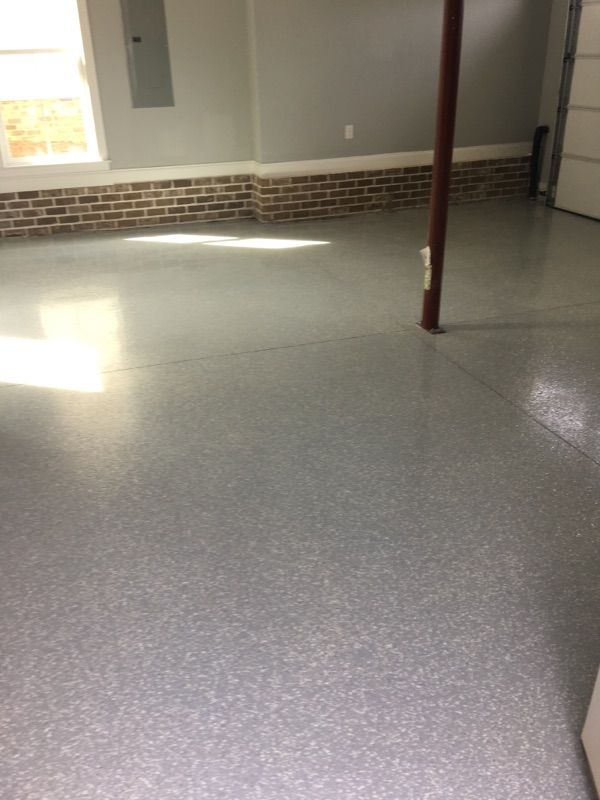 This photo shows a large section of a garage floor