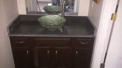 Cabinets resurfaced, granite top, sink and faucet 