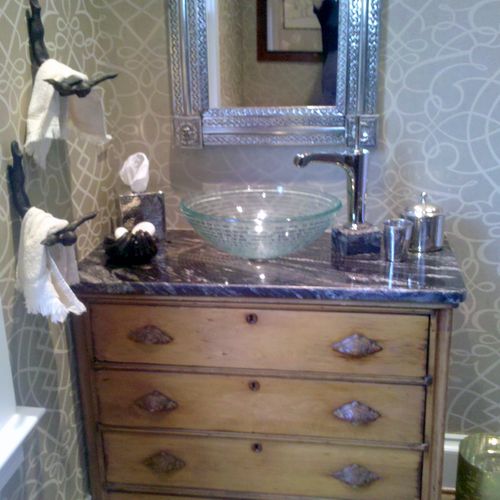 Transitional bathroom with an antique cabinet, con