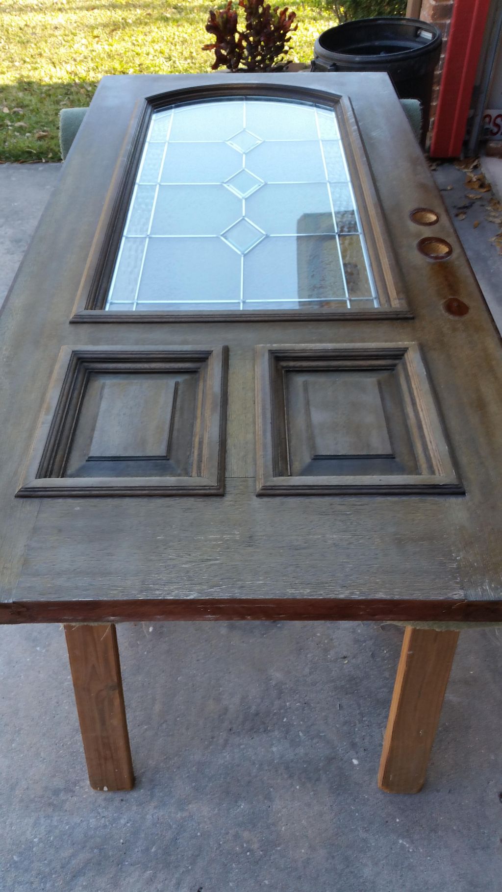 Faded and weathered door before.             