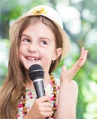 Vocal student Chloe Z. age 10 loves to sing musica
