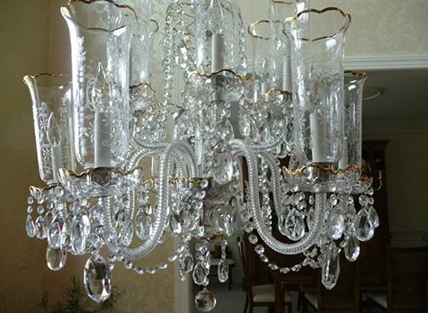 $10,000 gold tipped chandelier install on an allad