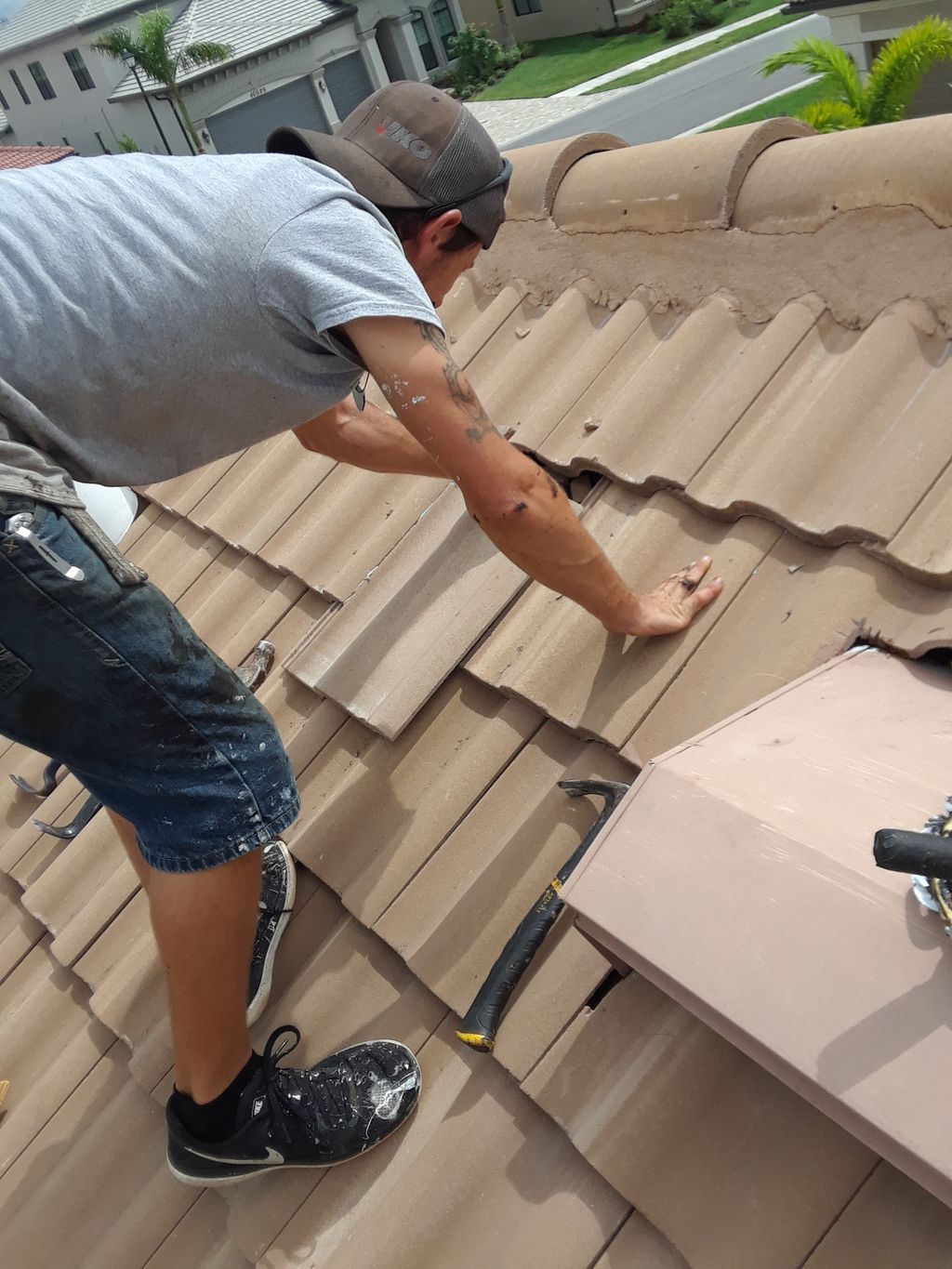 Tile roof repair (loose or wind lifted tiles.