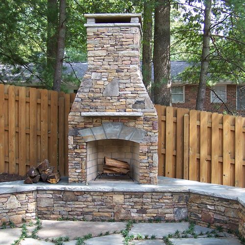 Dry stack stone outdoor Fireplace  with gas log li