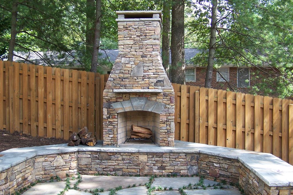 Dry stack stone outdoor Fireplace  with gas log li