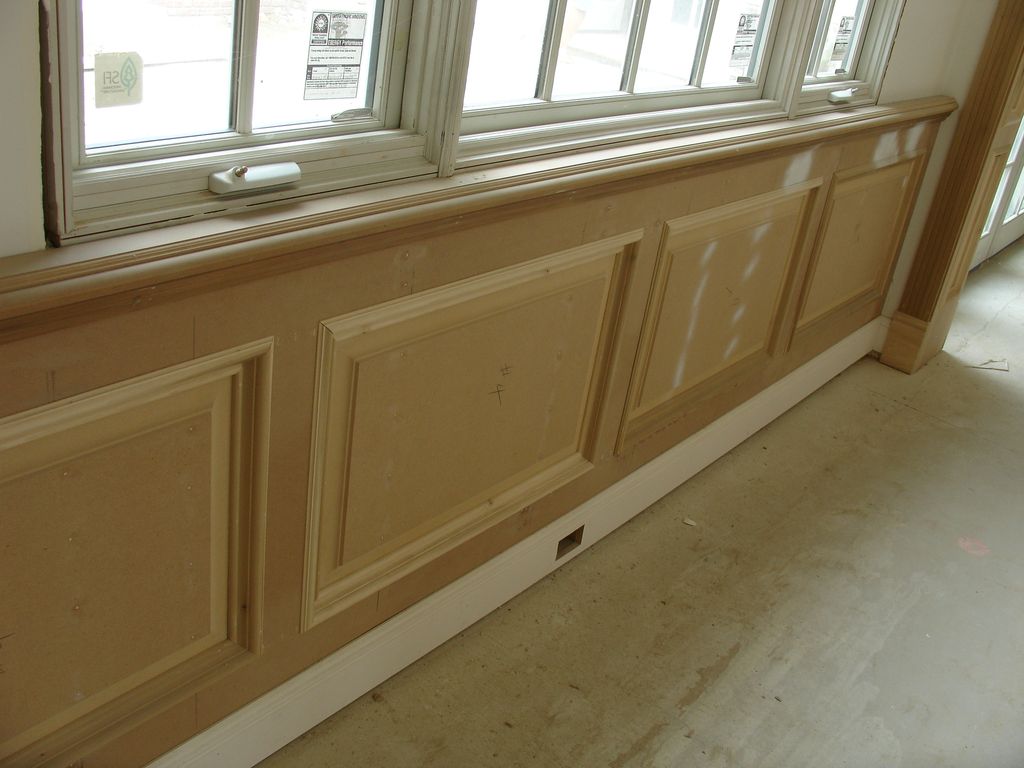 Raised panel wainscoting with raised panel molding