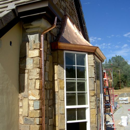 Curved Fascia gutter with copper downspouts