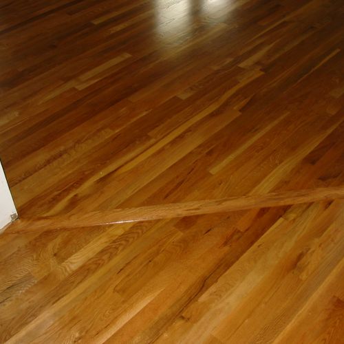 Oak floors with a natural finish and transitional 