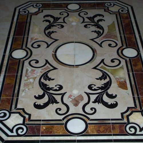 Water jet cut medallion installed in a dining area