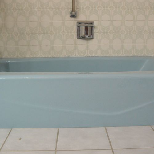 Before - Outdated Blue Bathtub