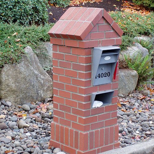 Brick mailbox with lockable mailbox and newspaper 